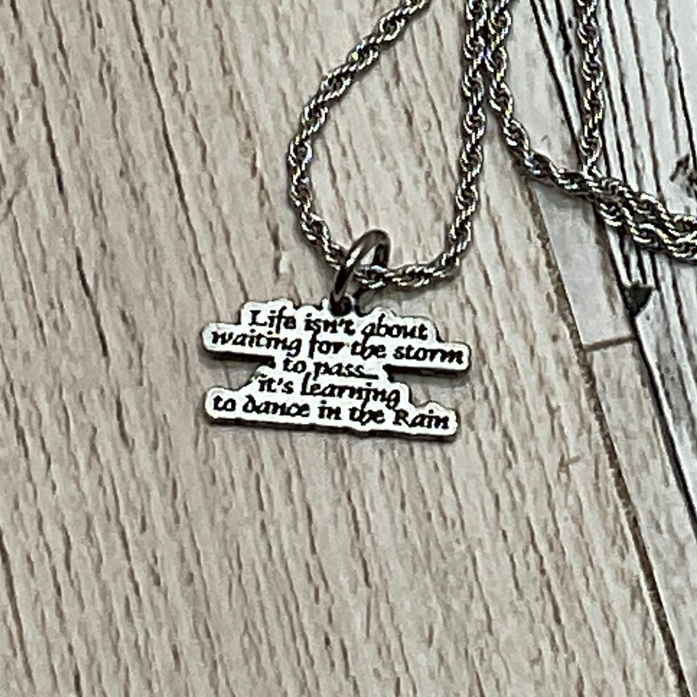 Life Isn't About Waiting For The Storm To Pass Single Charm Necklace - Sassy Chick Clothing